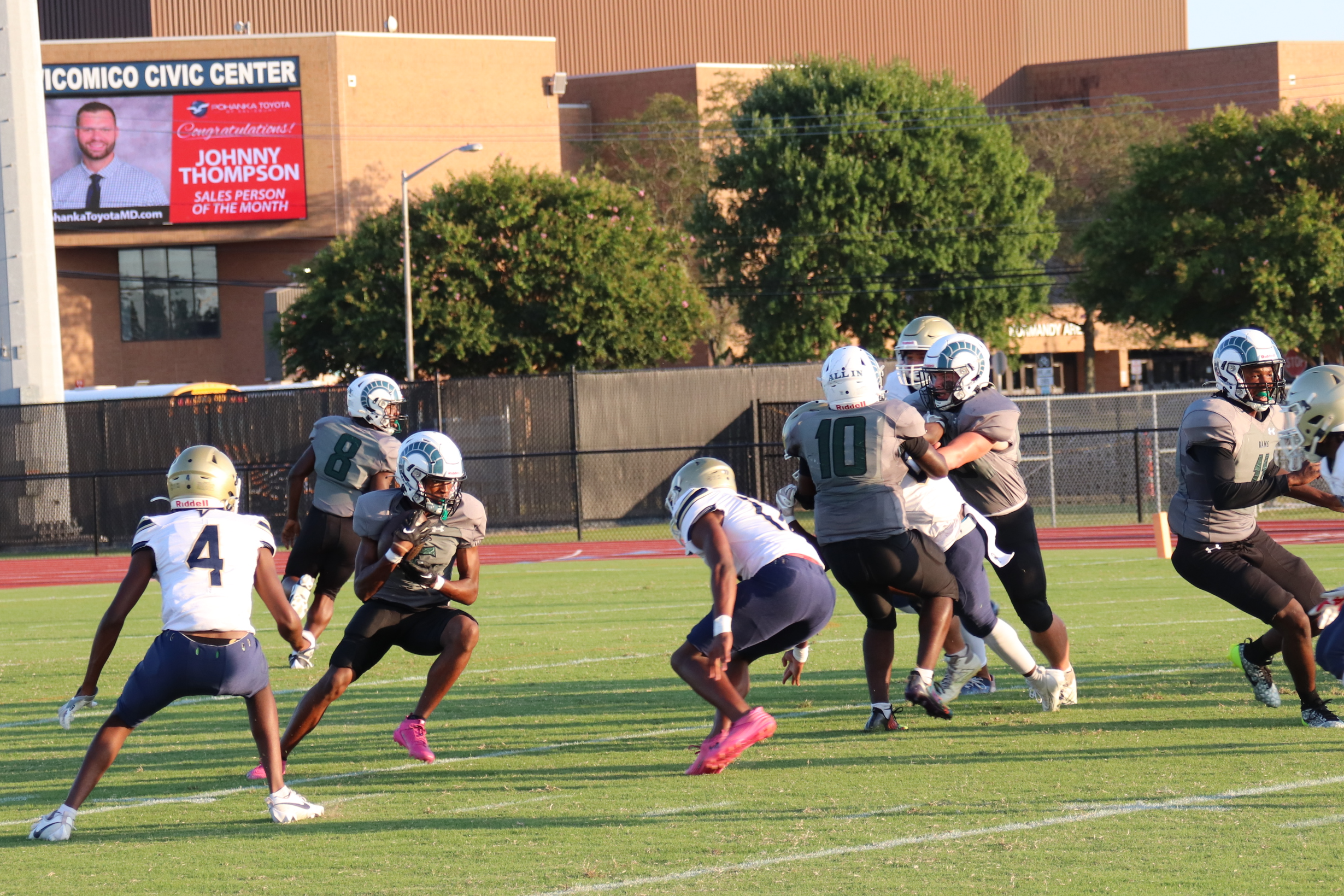 Parkside Rams student-athlete running the ball during Rams football game vs Cambridge-SD