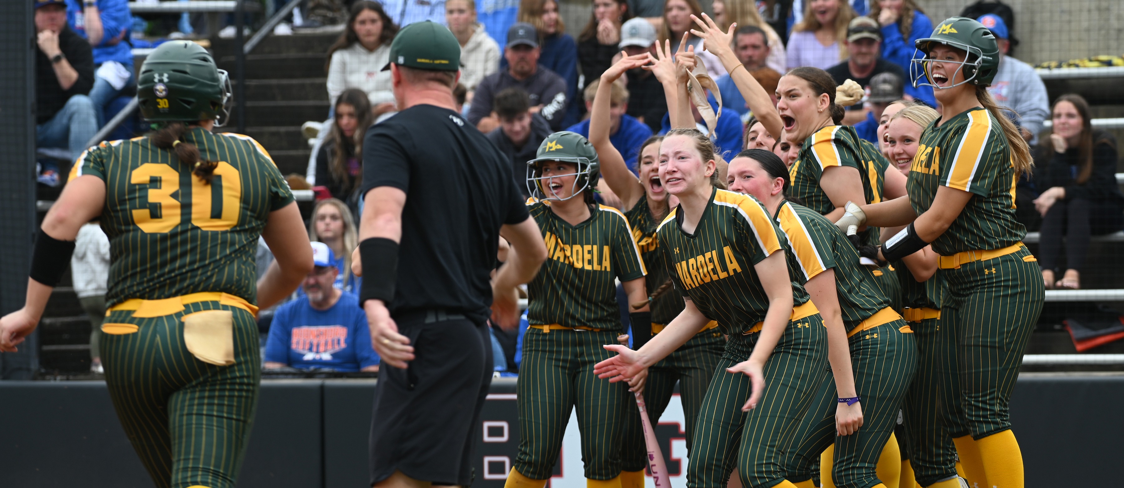 Mardela softball team celebrates home run during state championship game