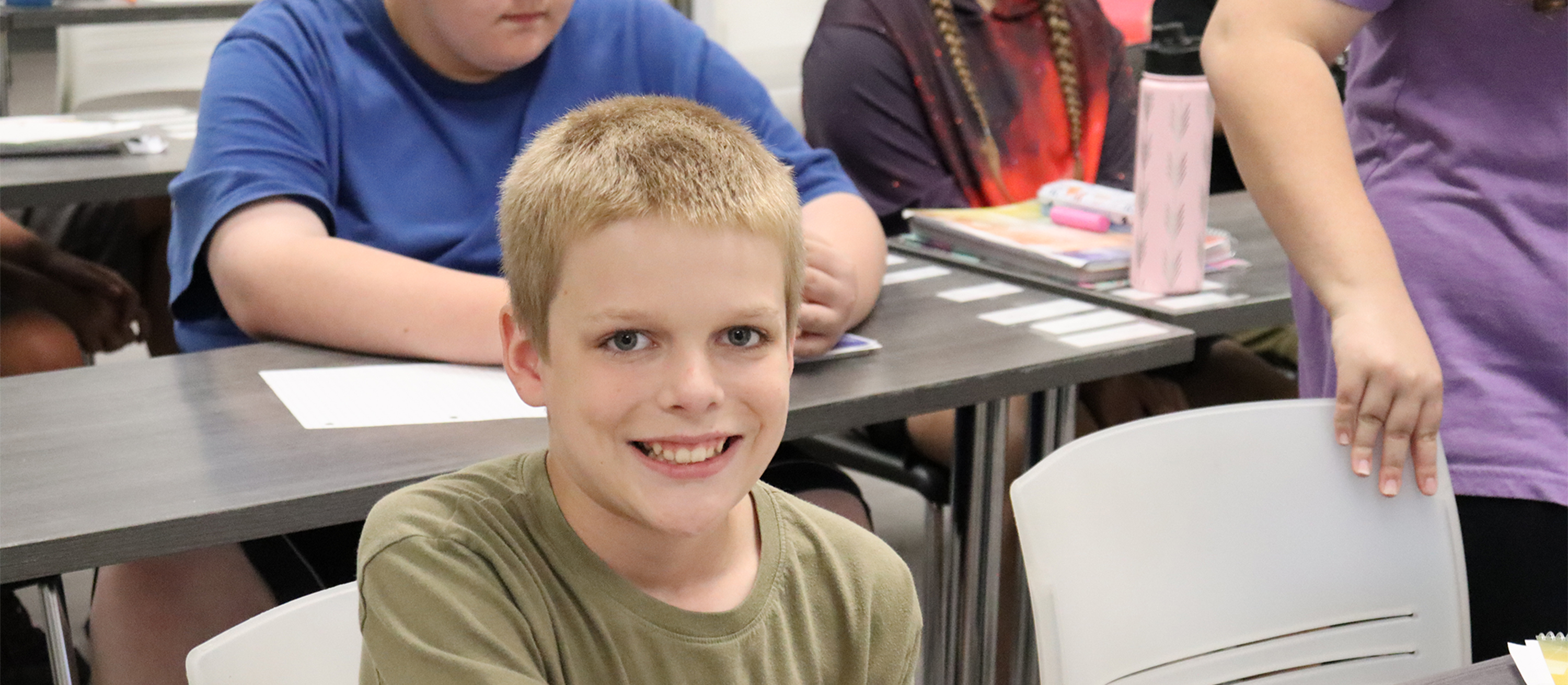 boy smiles at camera 