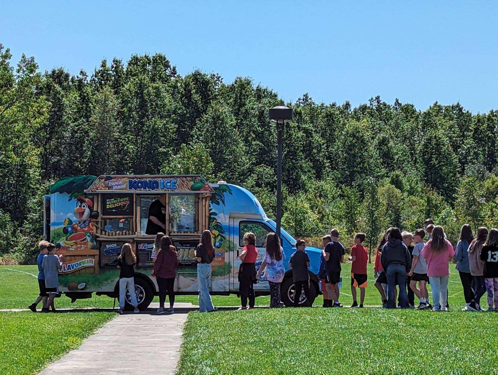 Students were treated to Kona ice and enjoyed this beautiful day!