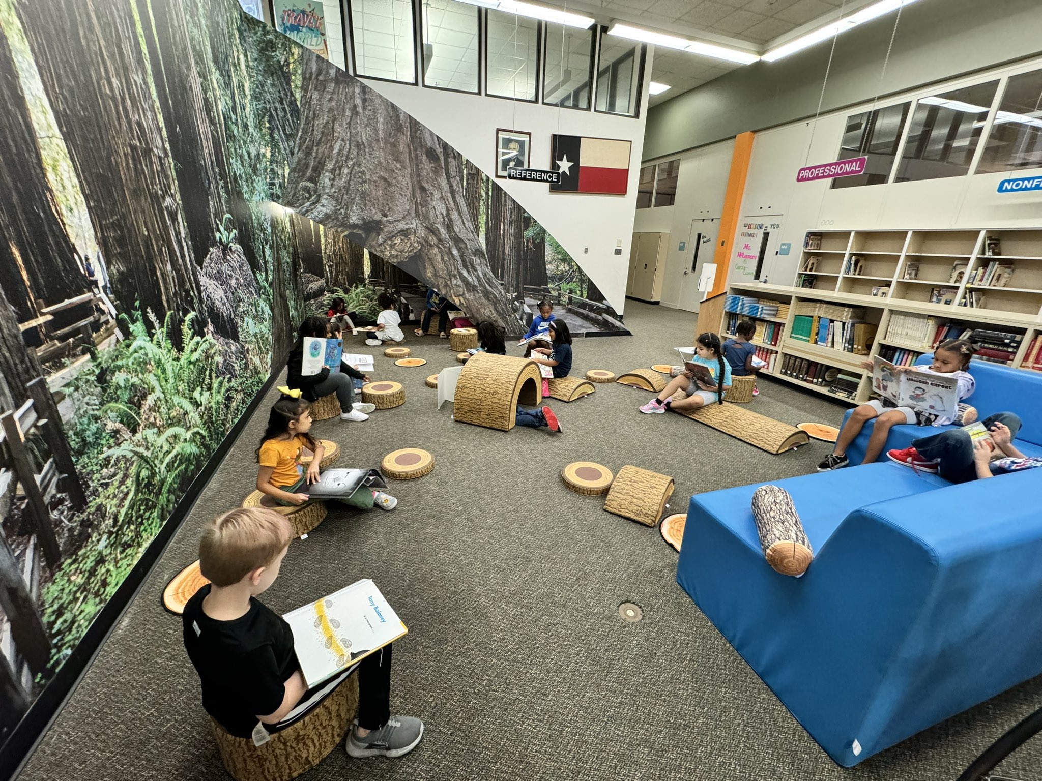 Children reading in the Library