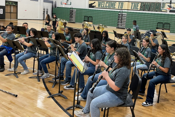 ARMS Fine Arts band playing in gym