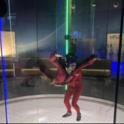 student sky diving in simulator