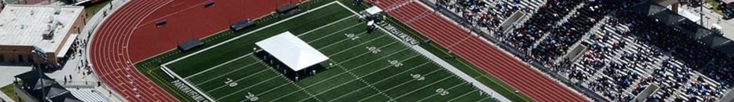 aerial view of football field with track