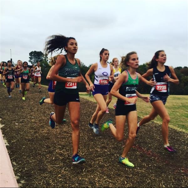 group of students running in race