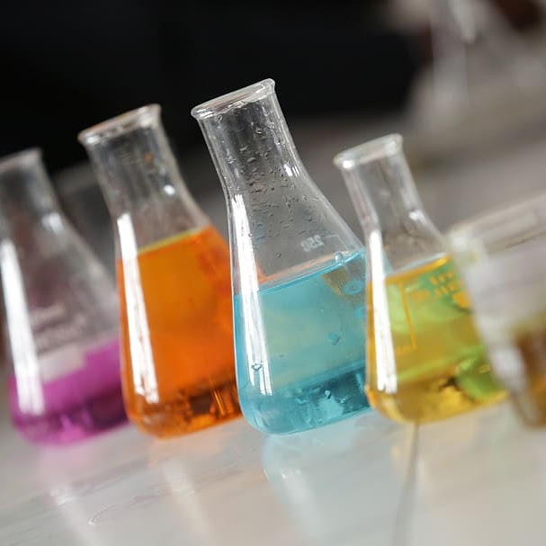 Science beakers with various colors