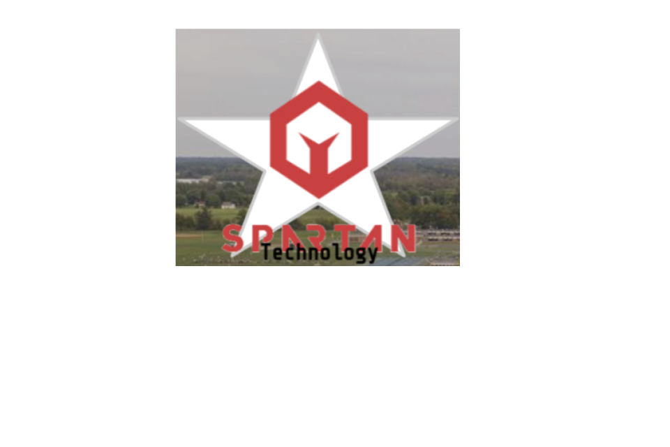 Spartan Technology Logo with aerial view of school property in the background