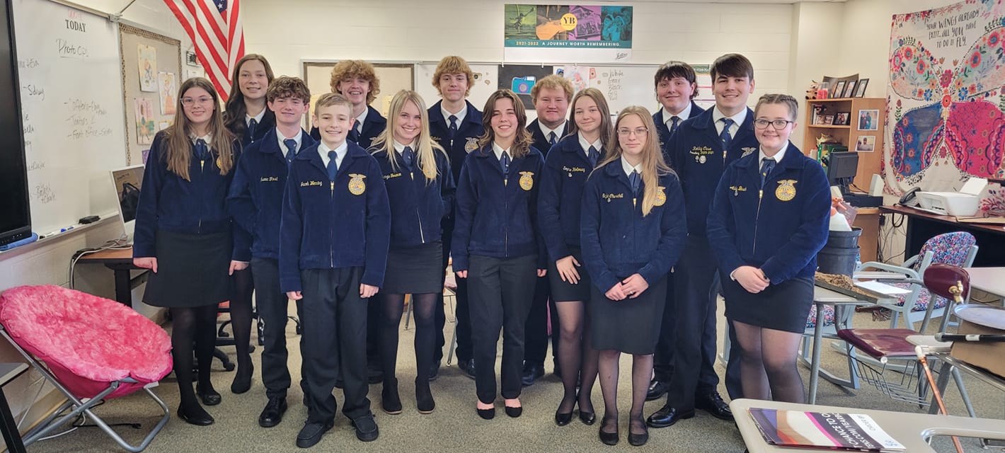 Students standing in FFA Blue Jackets