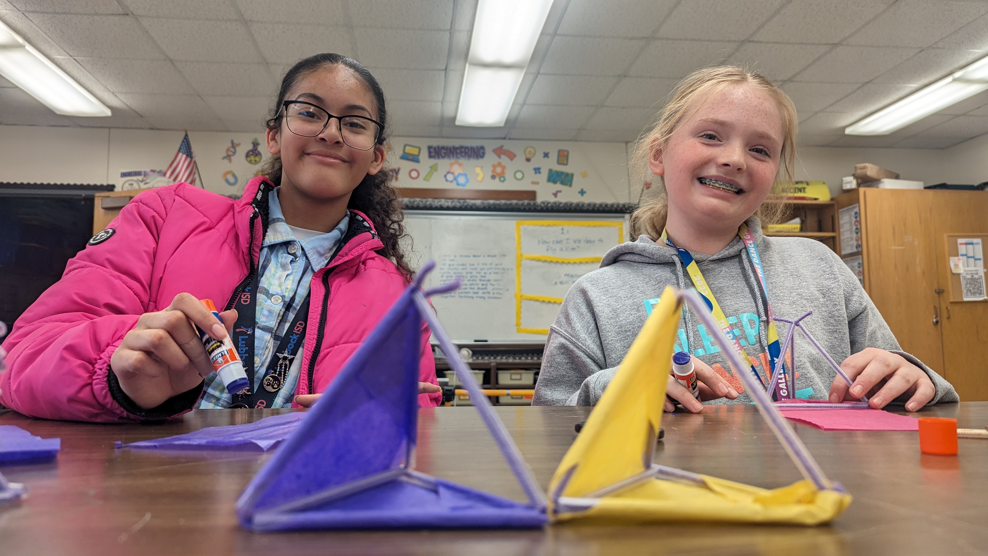 6th graders working on their tetrahedron kite