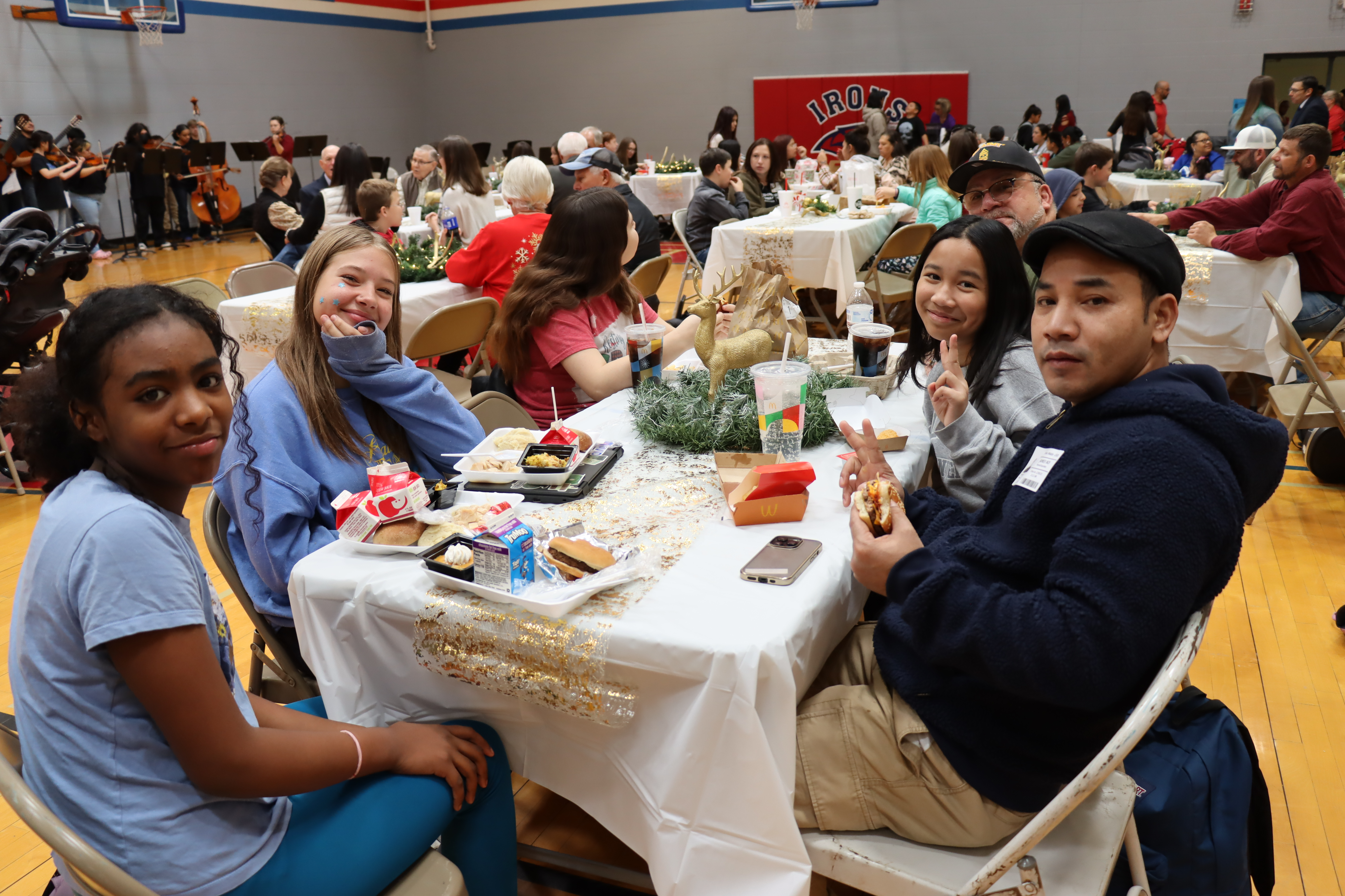 Students and Parents posing at Ed Irons Day lunch