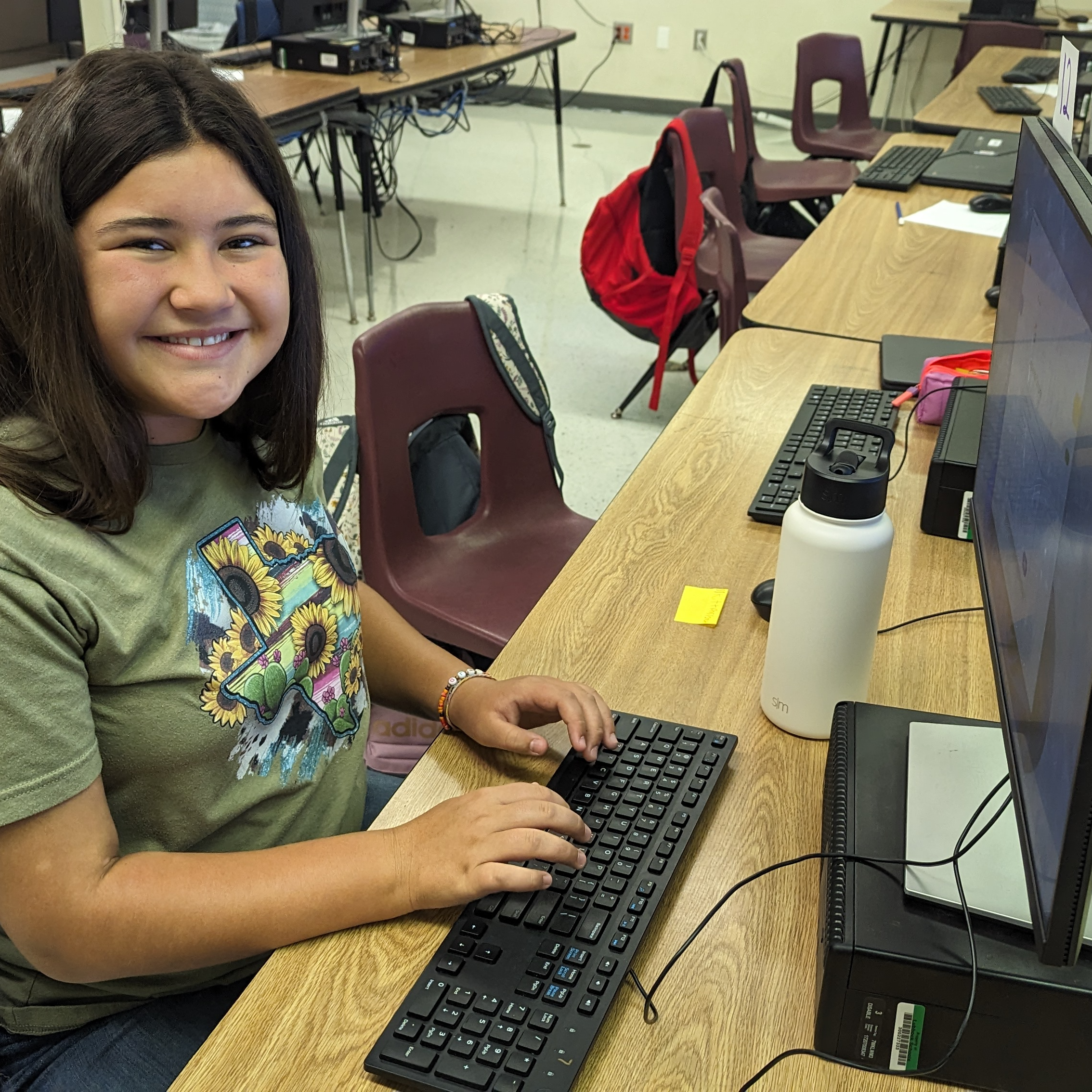 student working on computers