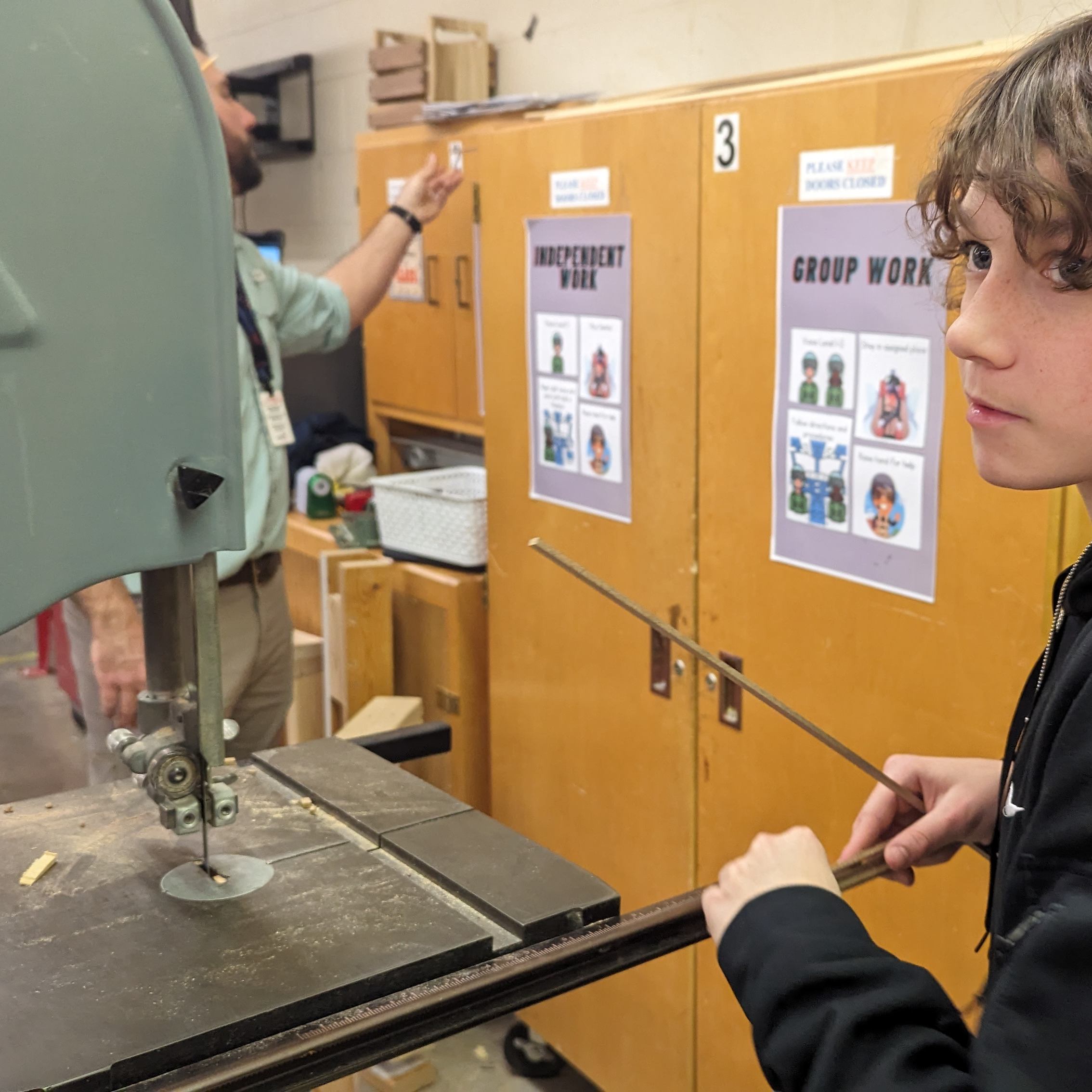 student working with machinery