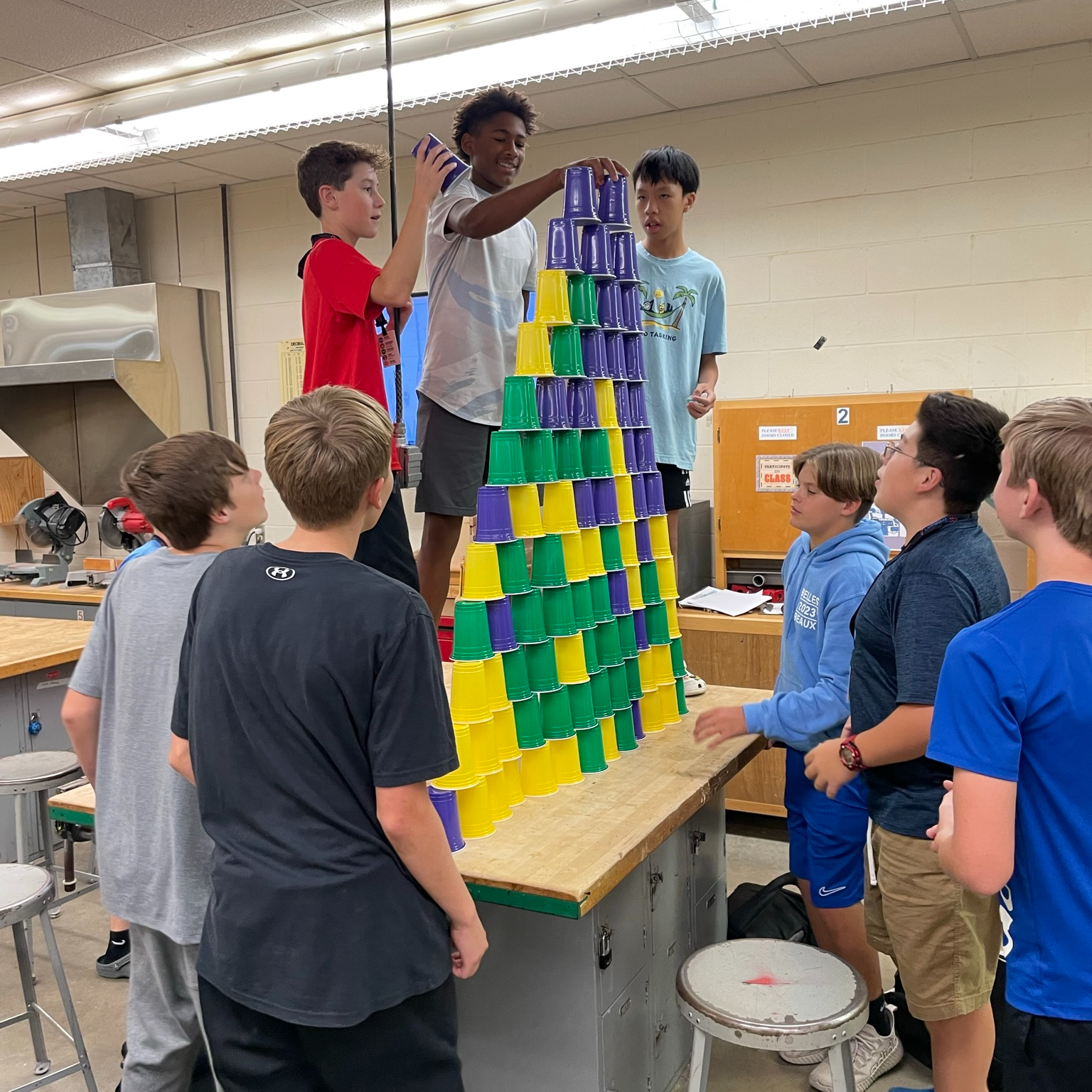 students stacking cups 