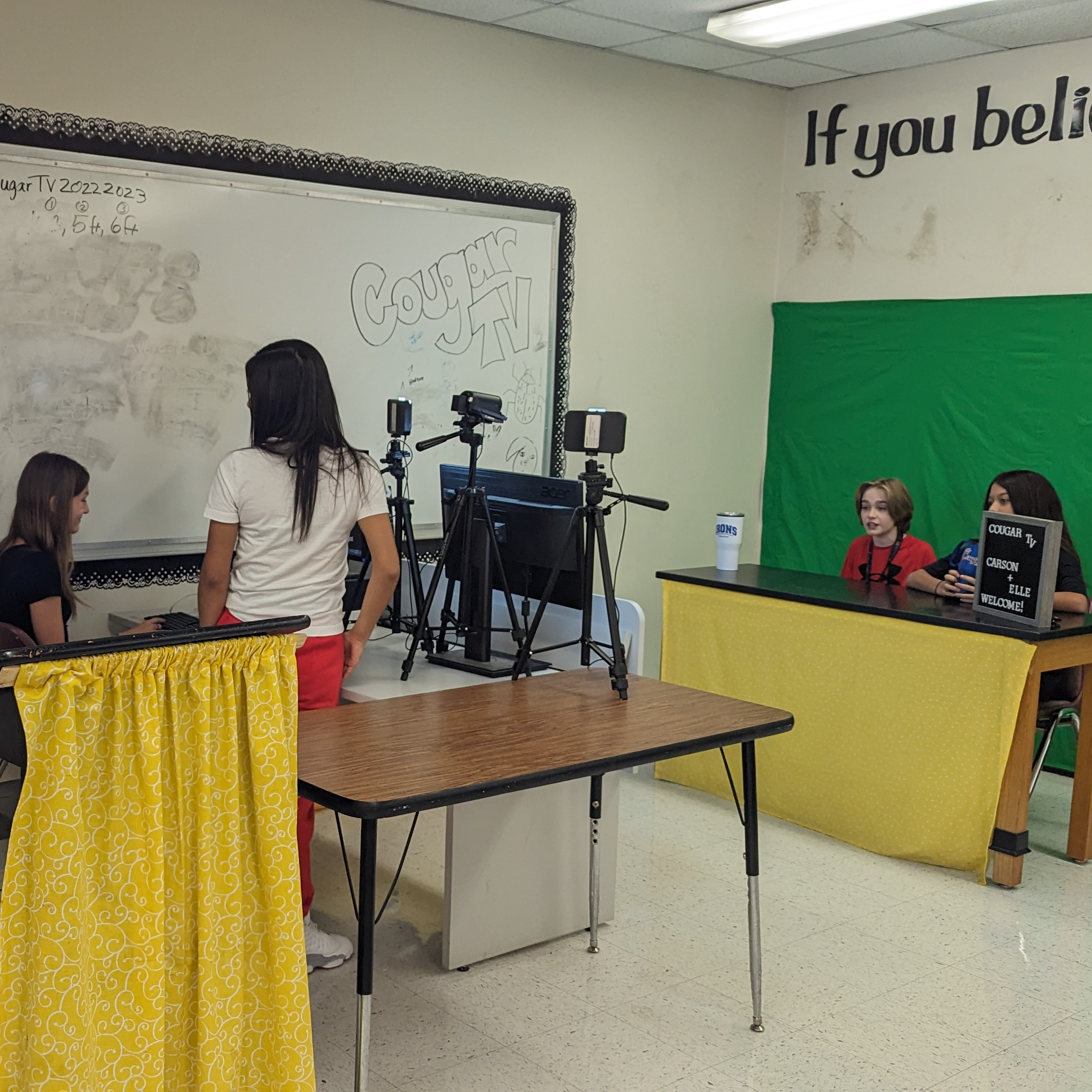 students filming Cougar TV