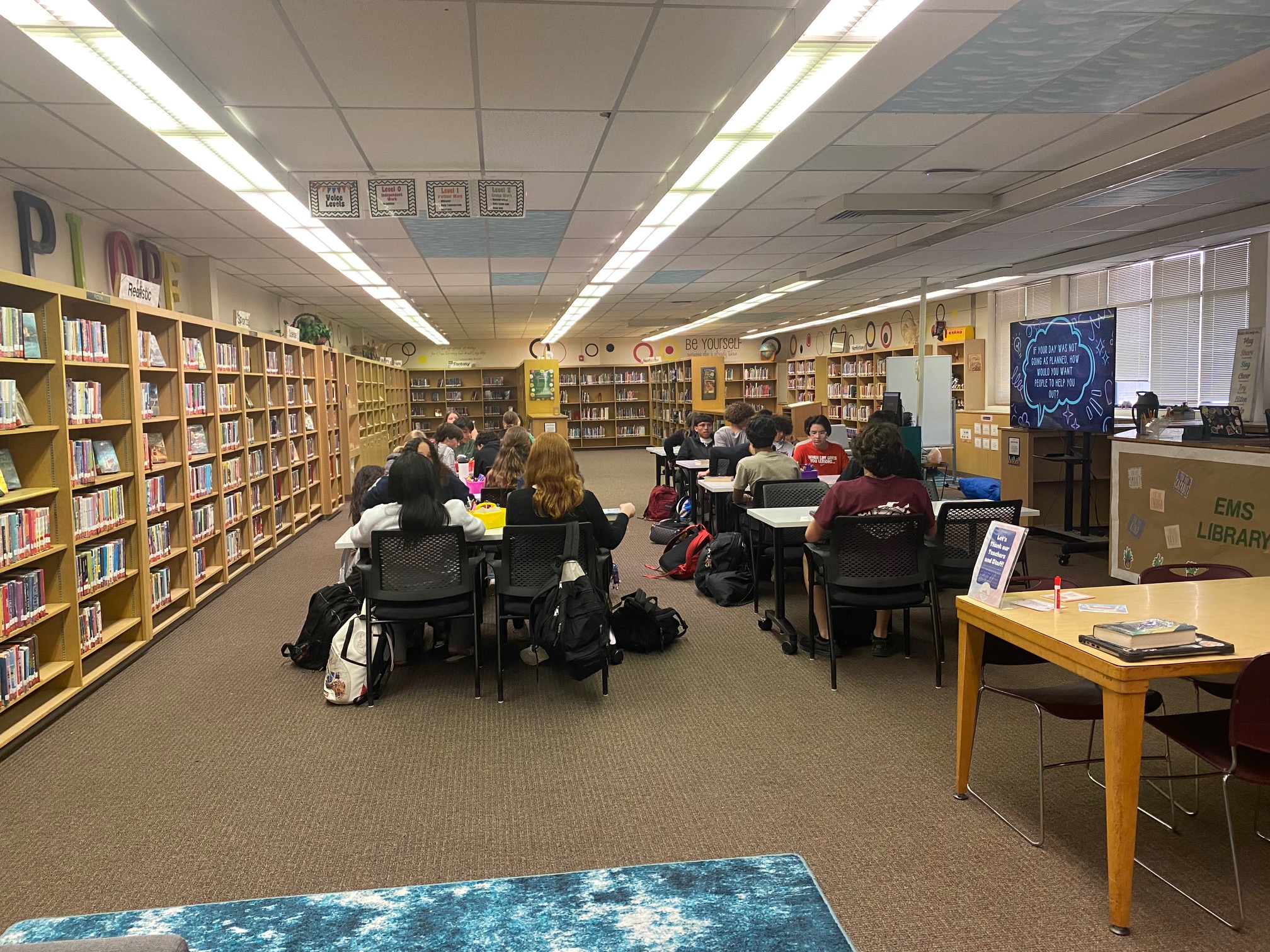 Students working in a library