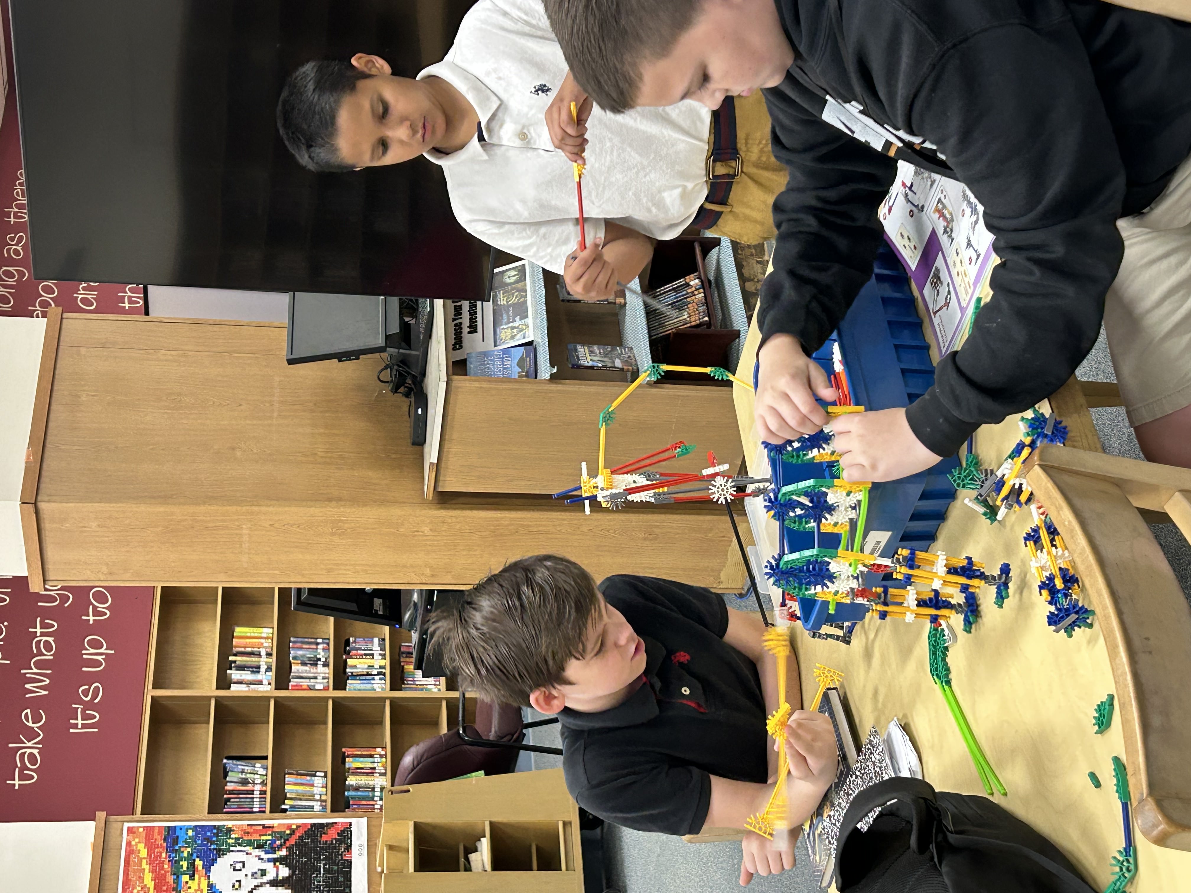 Students working with Knex building toys