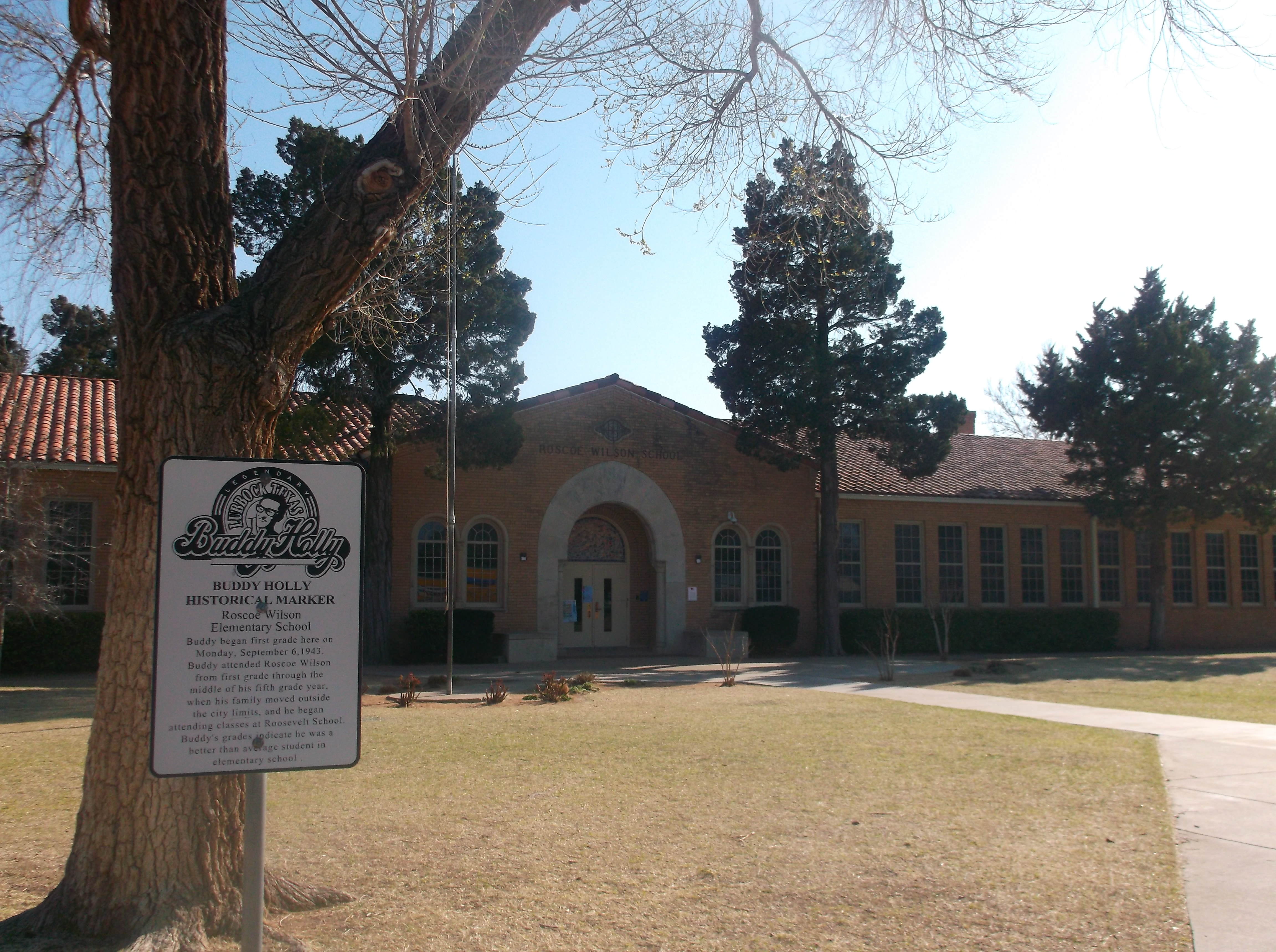 Roscoe Wilson Elementary school building with Buddy Holly historical marker