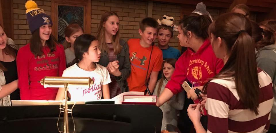 People around a piano