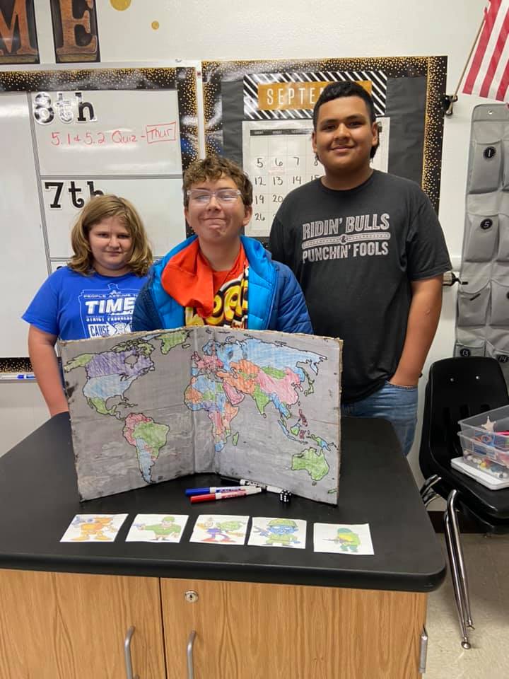 Students display homemade board game