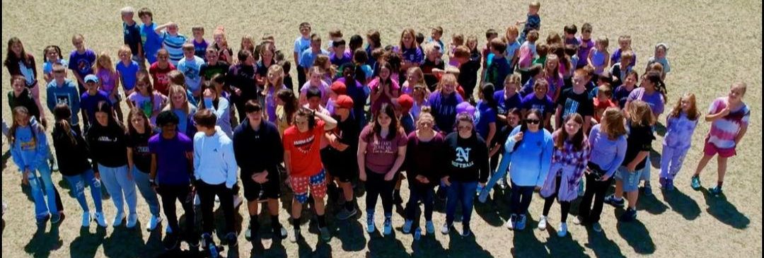 Group photo of children taken outdoors