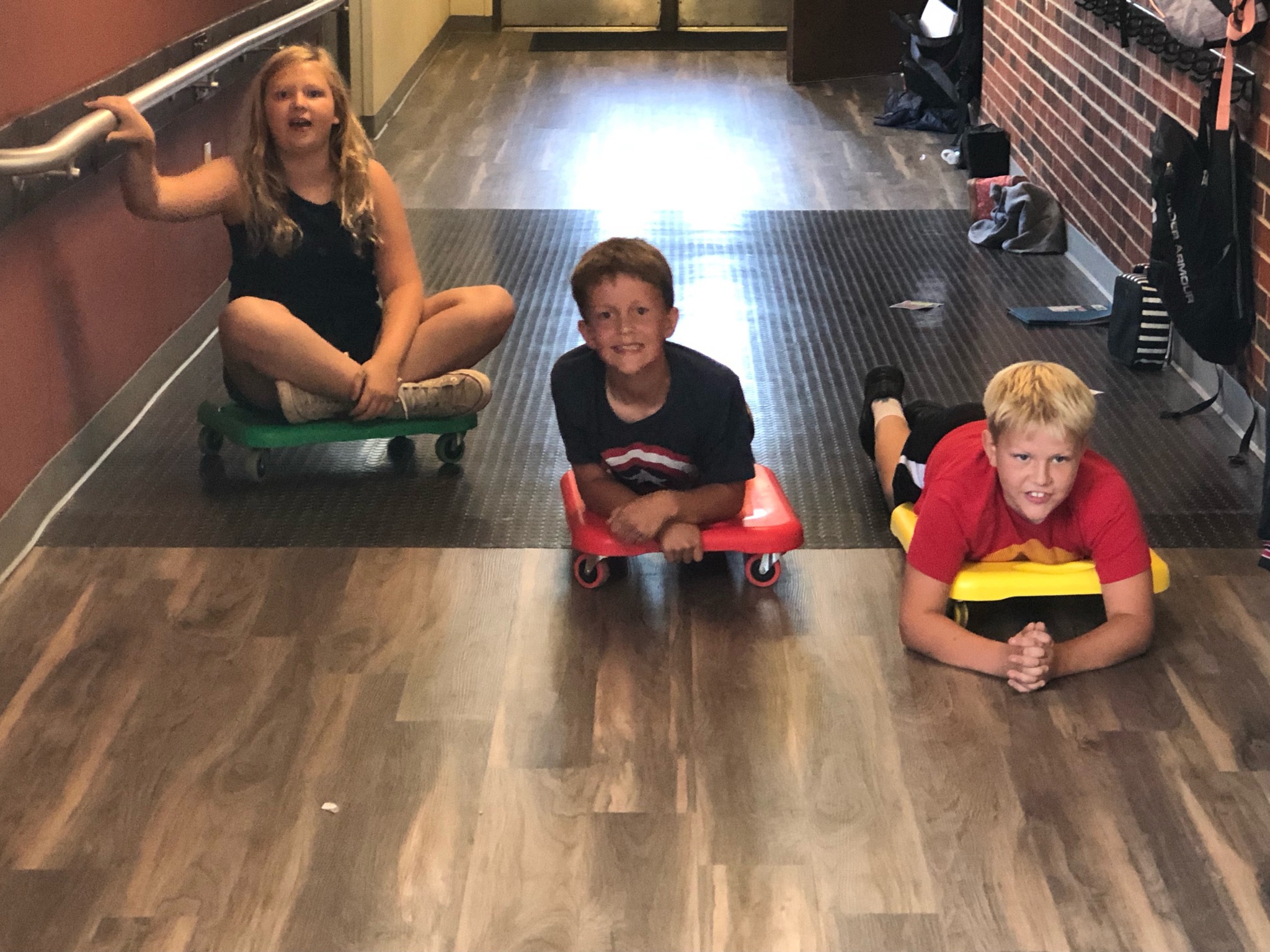 Students on scooters