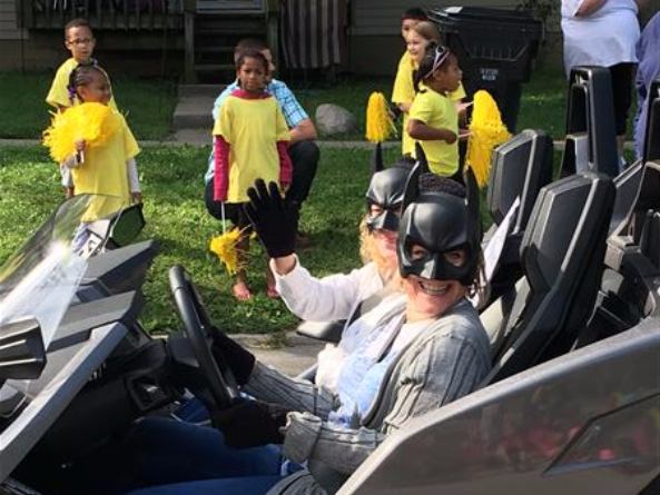 teachers driving in batmobile