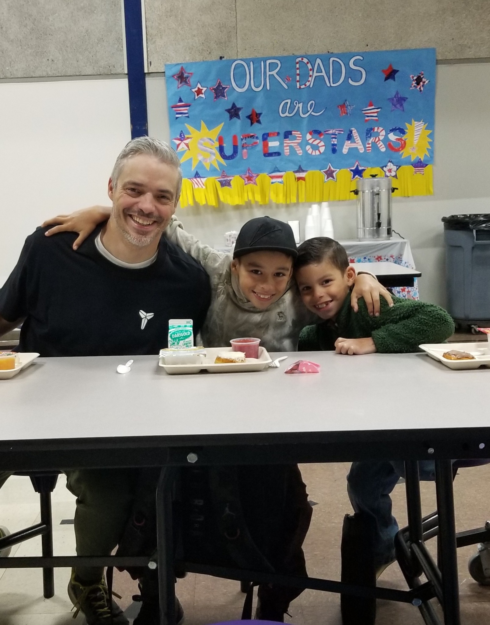 Picture of Dad with two sons.