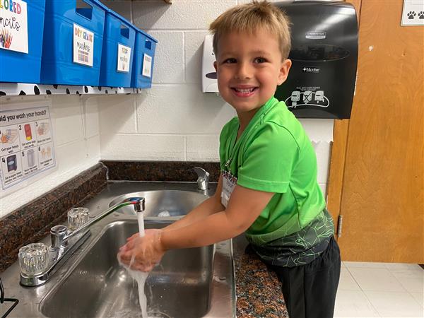 Student Washing Hands