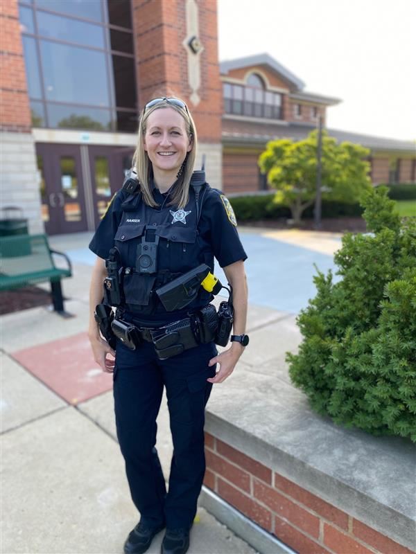 The School Resource Officer Posing for a picture. 