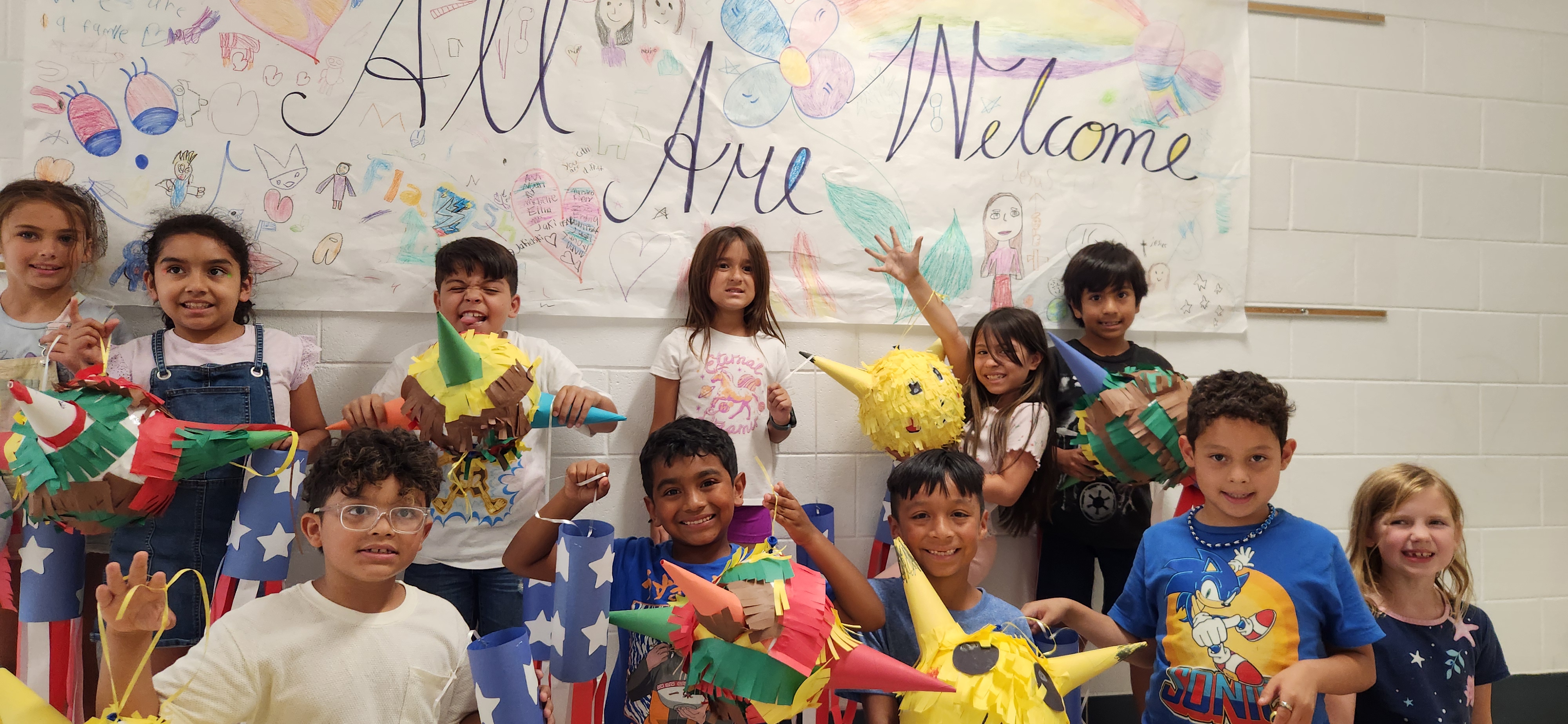 Students in class with their projects