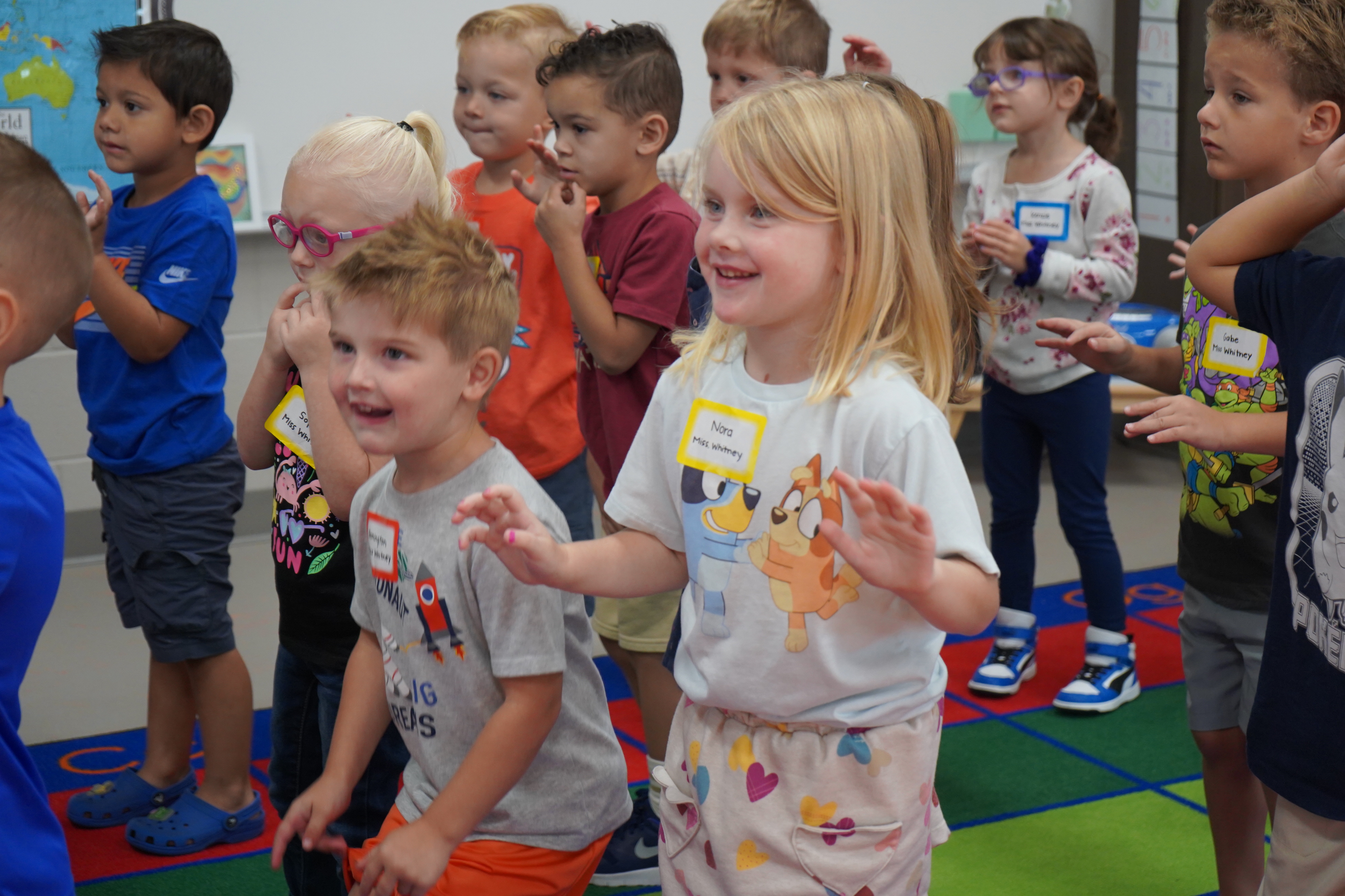 Students smiling and dancing