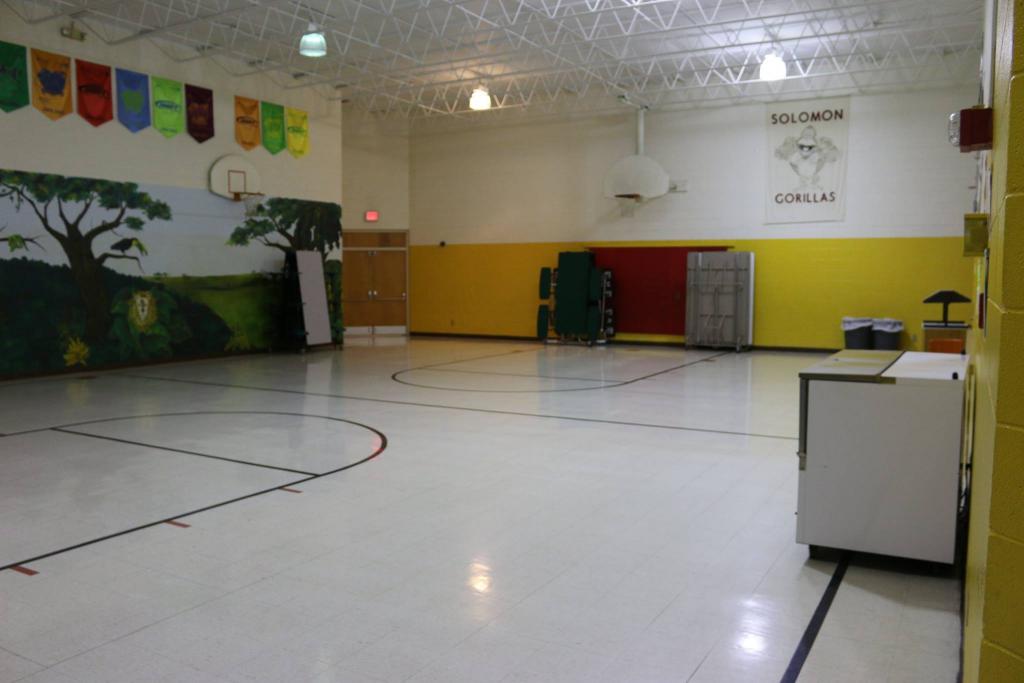 A photo of a small school gym