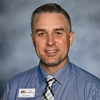 Mr. John Thompson