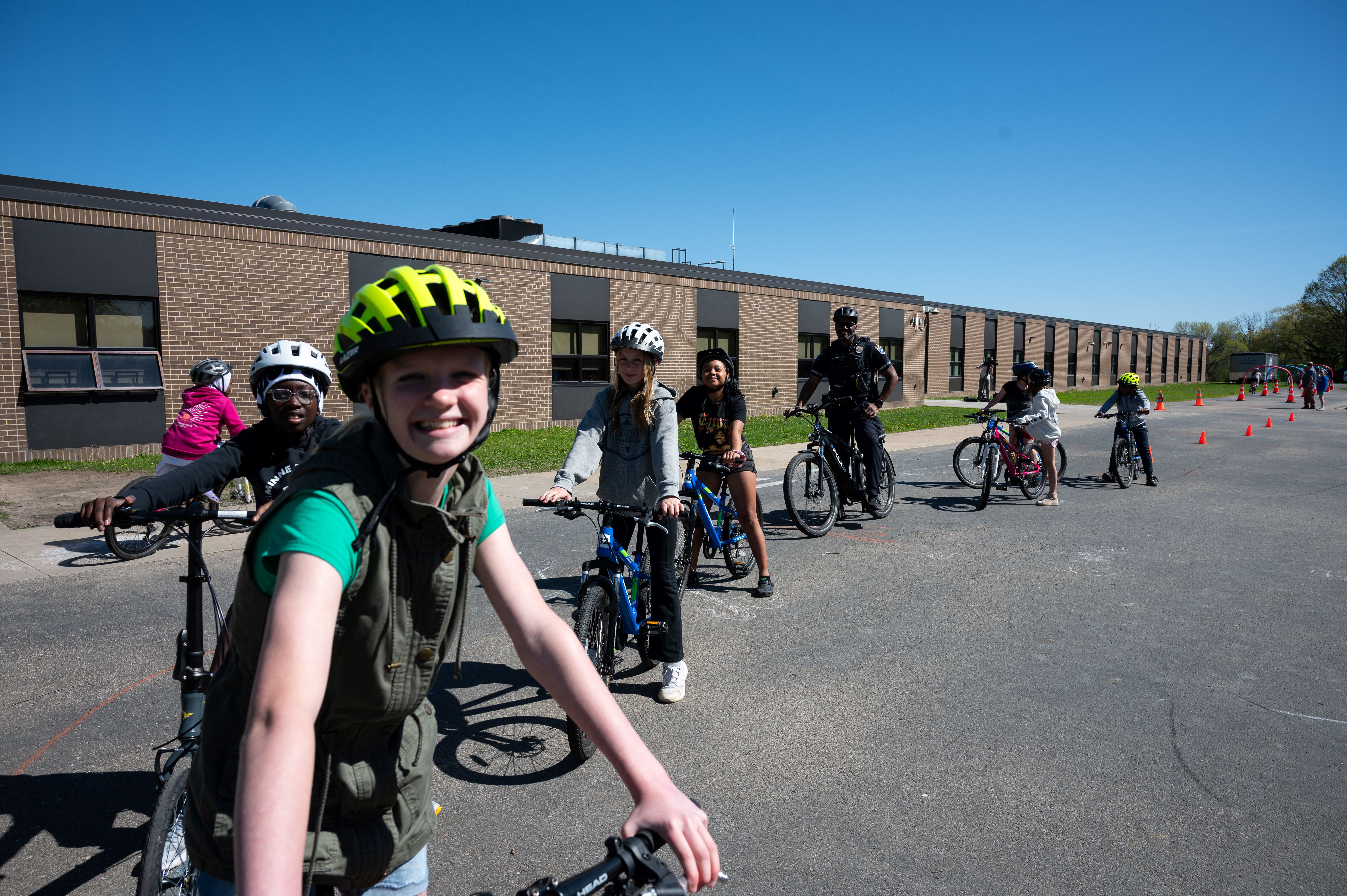 students lined up on bikes