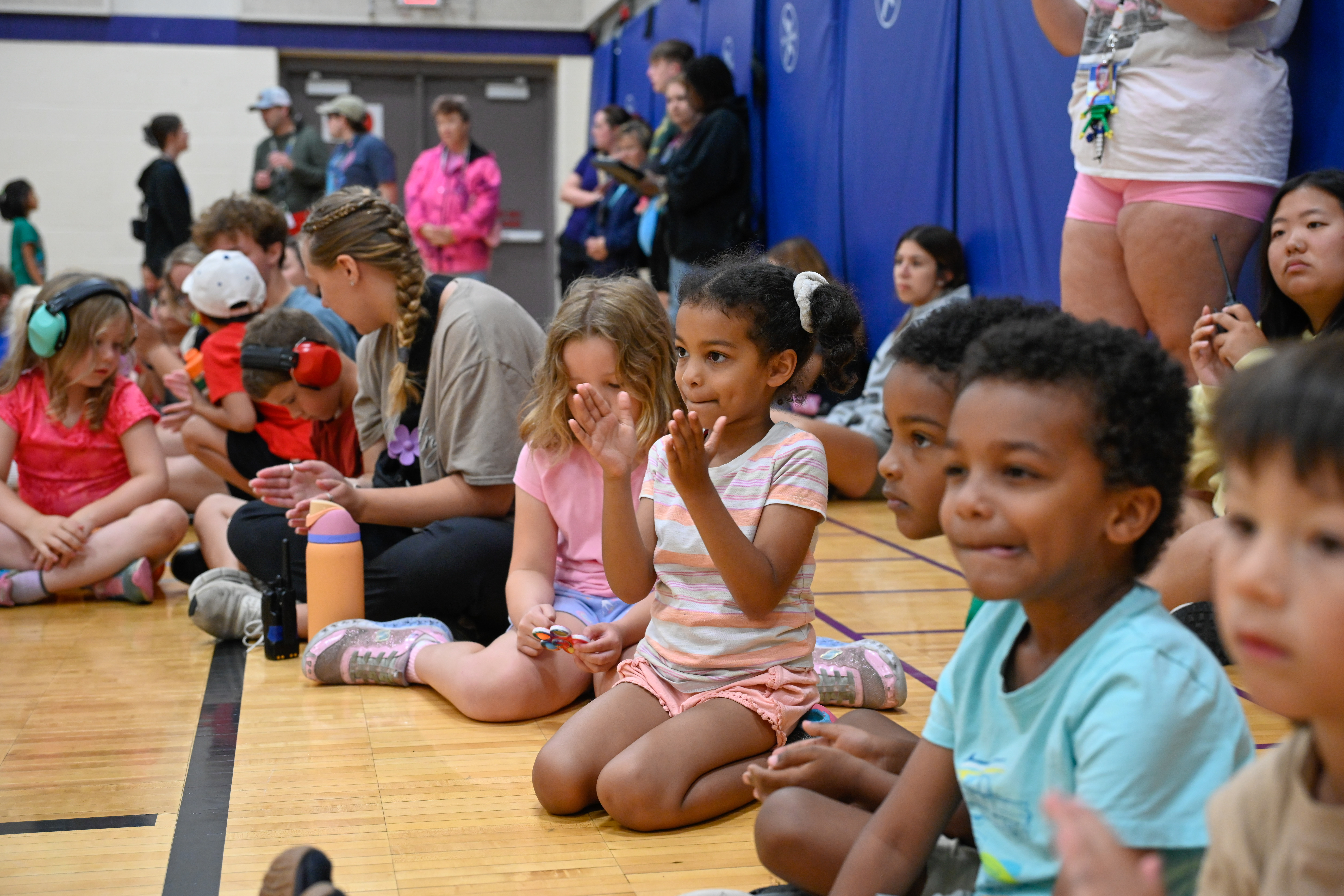 Students clapping along