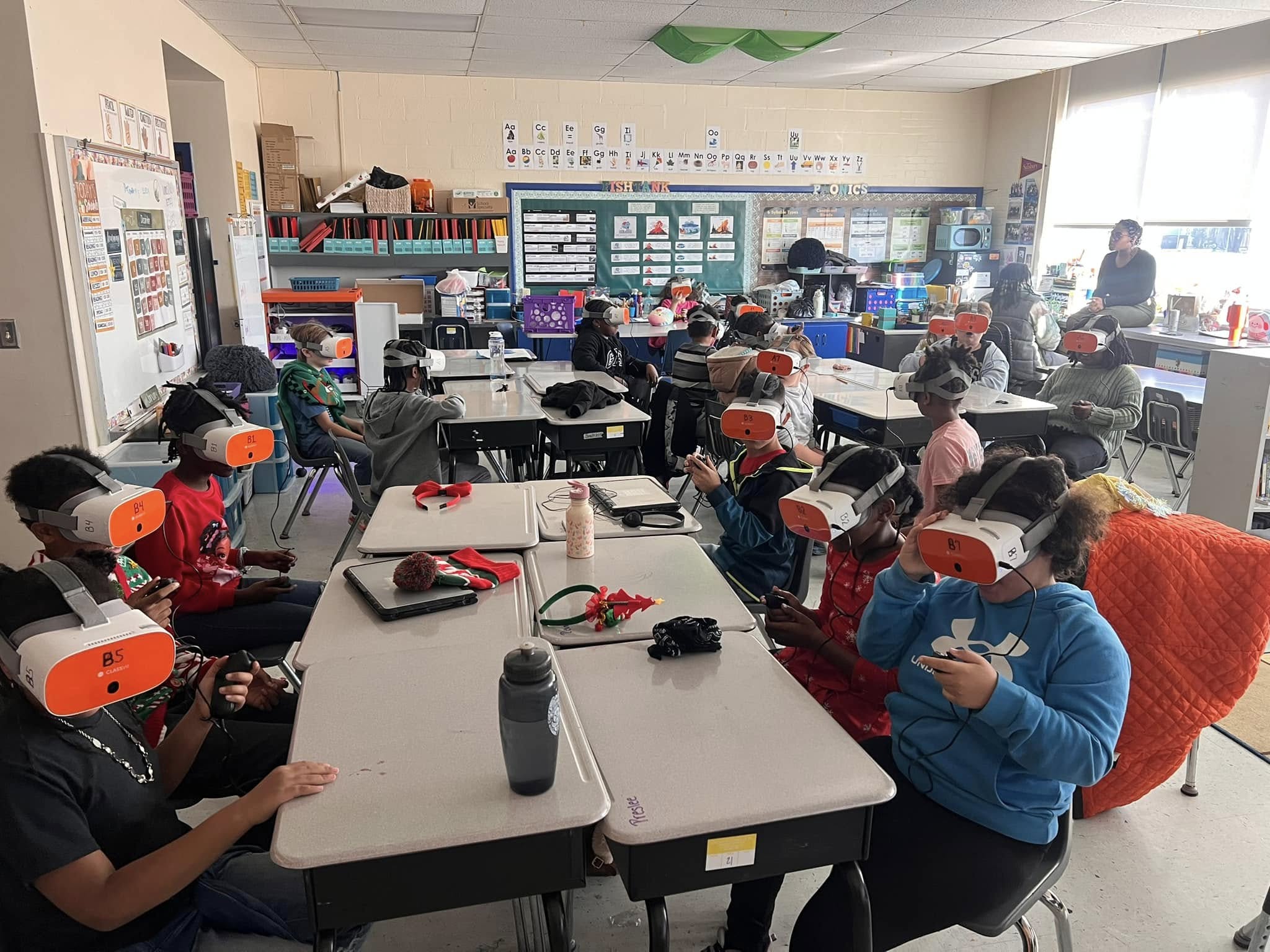 Image of students wearing Virtual Reality headsets in class