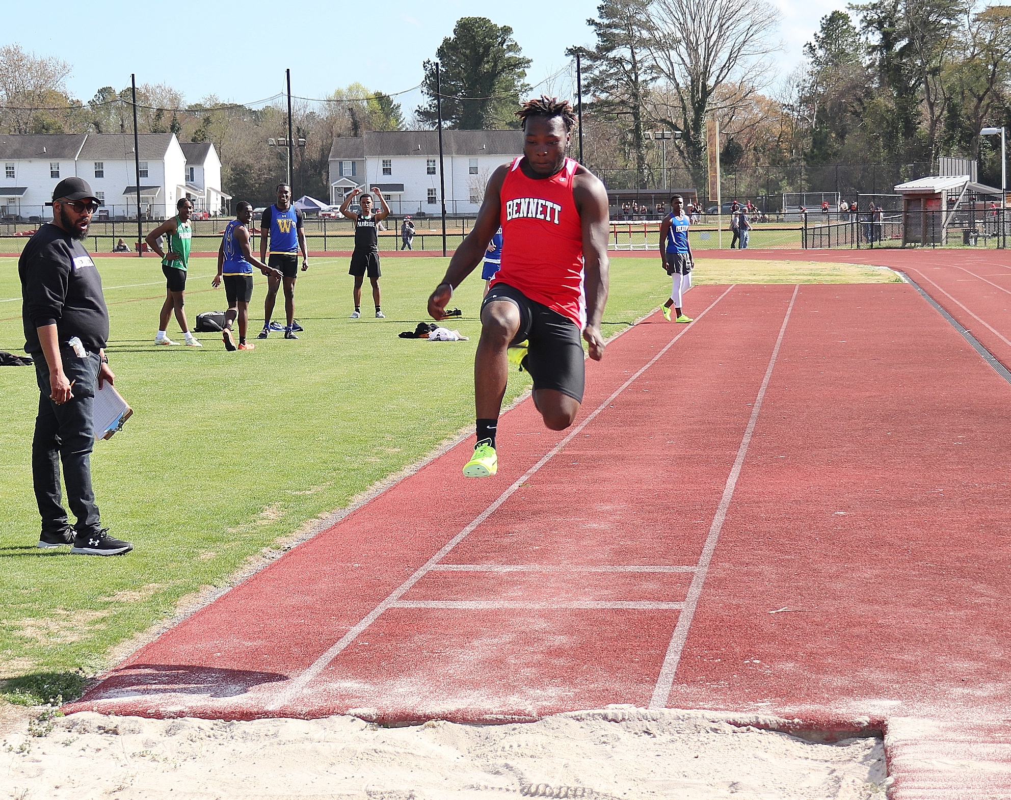 athlete competing in the triple jump