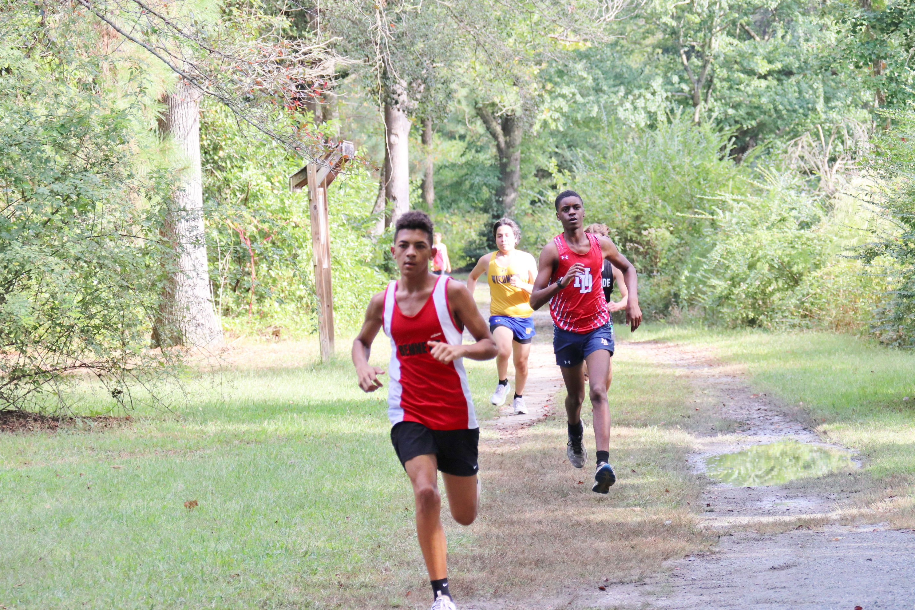 Image of students running cross country