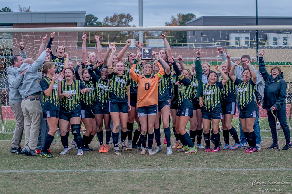 Image of Mardela High girls soccer team celebrating a win