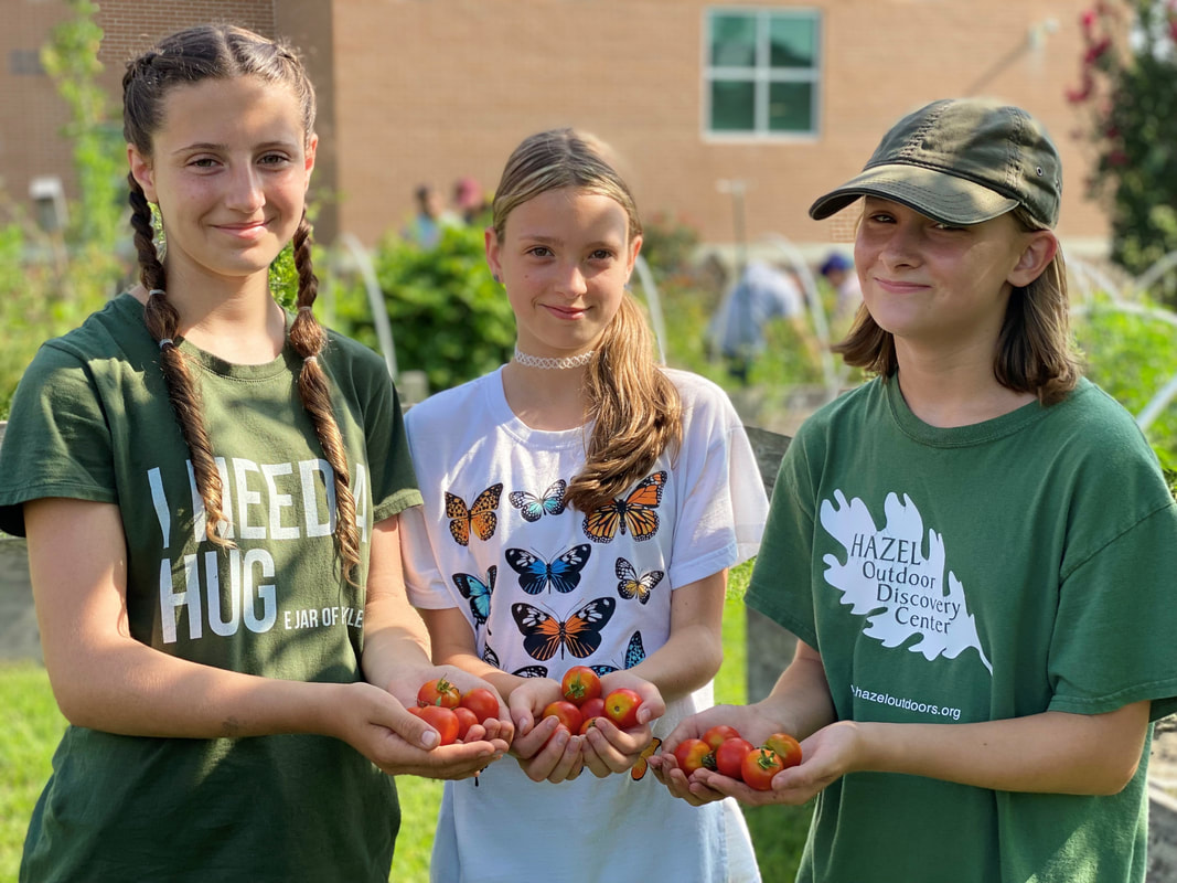 Image of students in the NeXgen garden