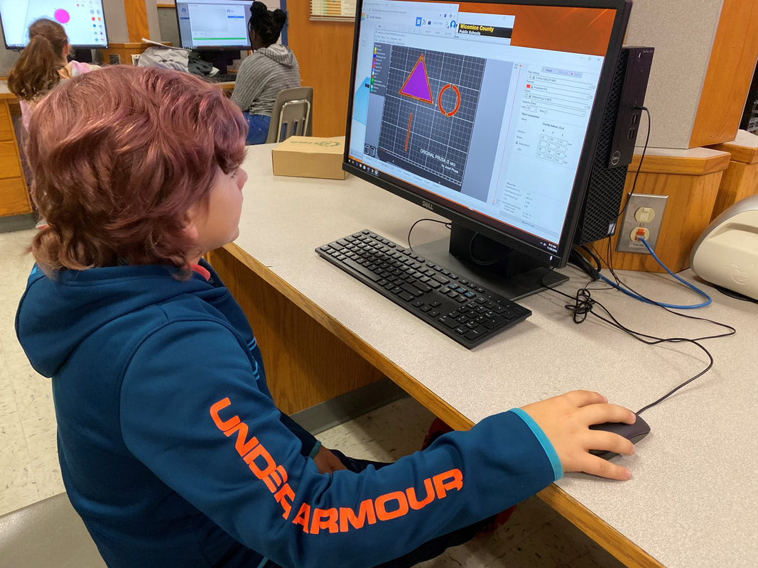 Image of student working on a computer