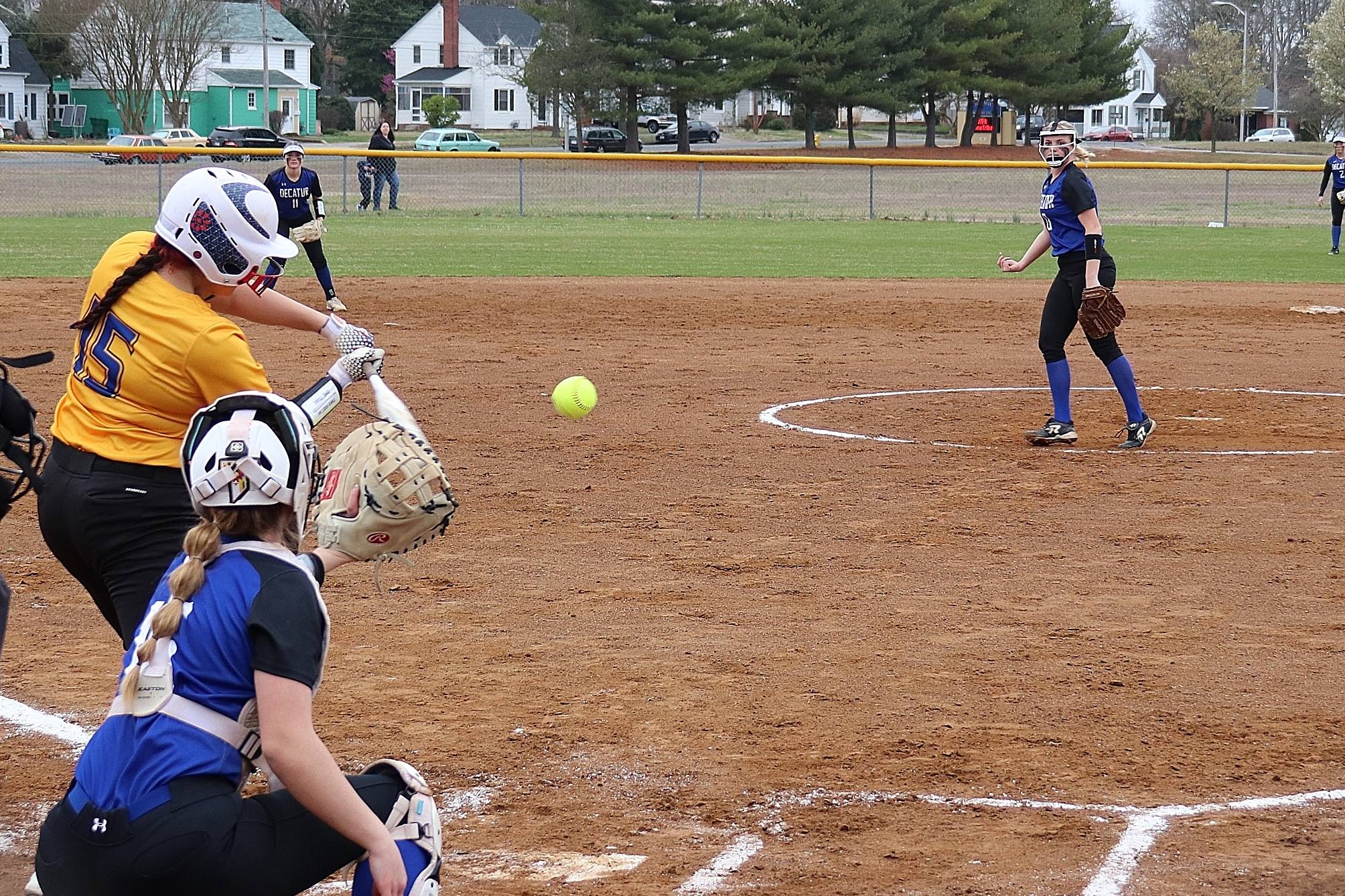 batter swings at pitch