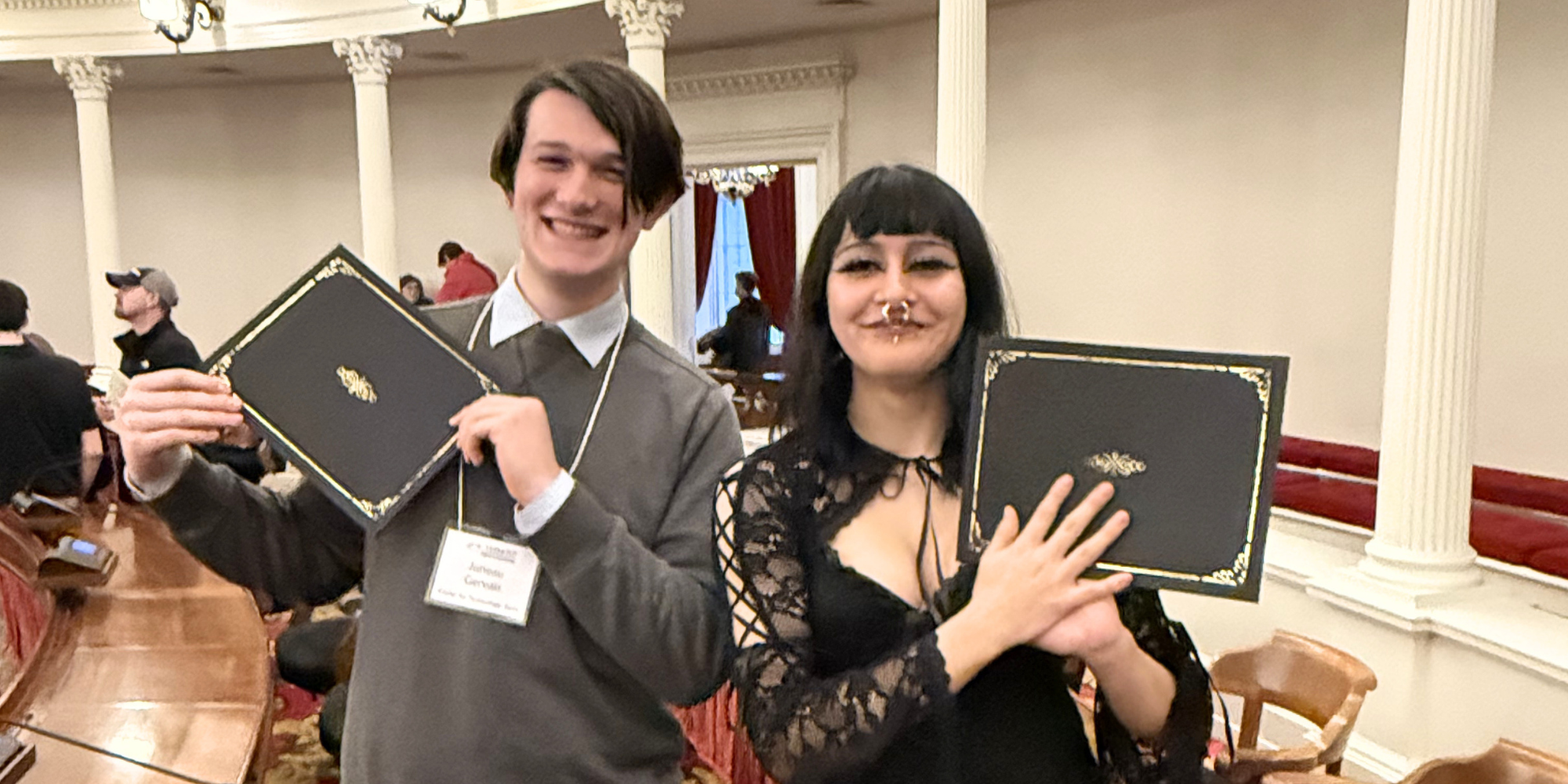 Students holding certificates 
