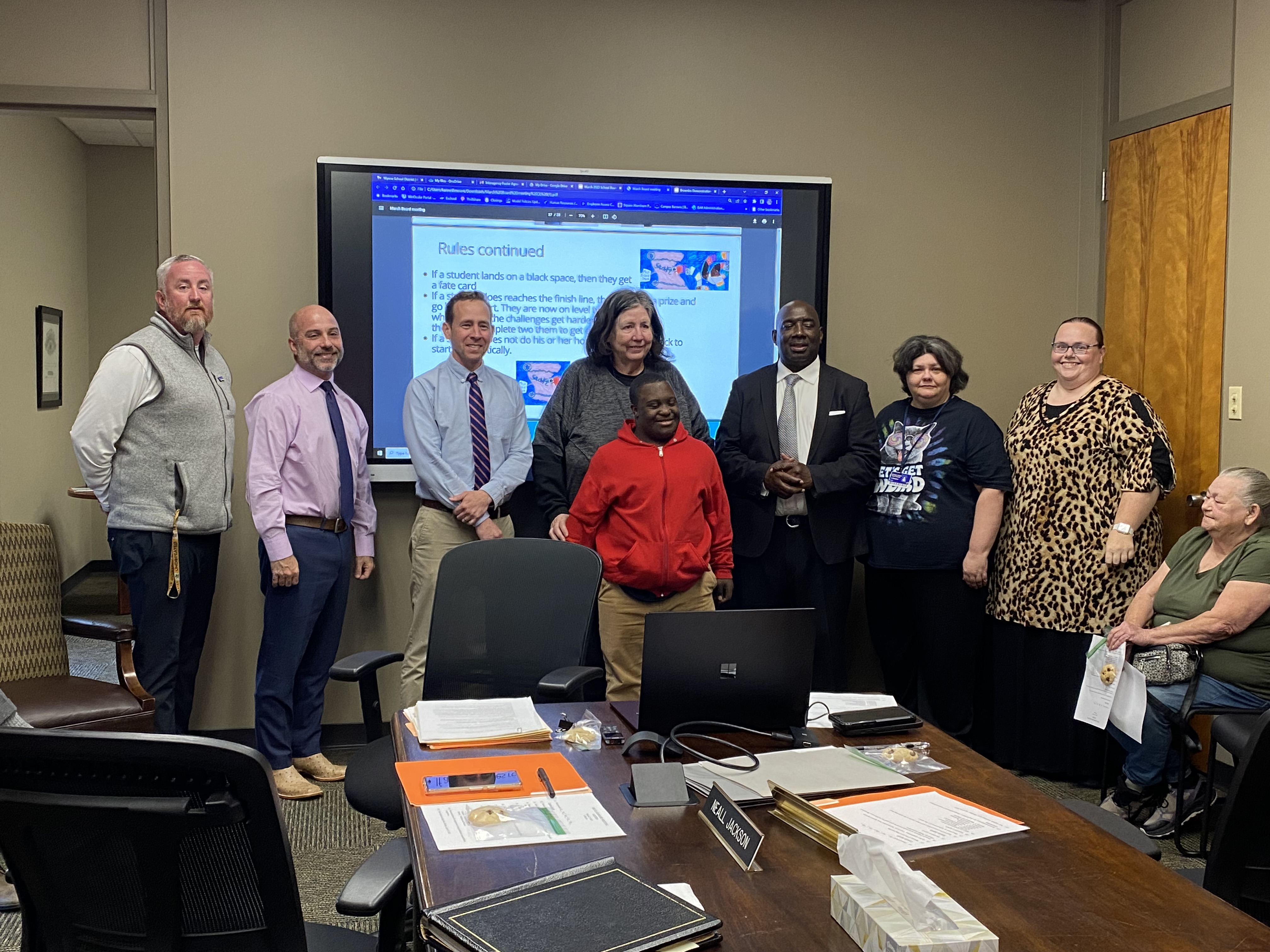 Students visiting with the School Board