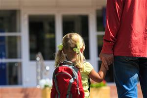 Kid holding parent hand