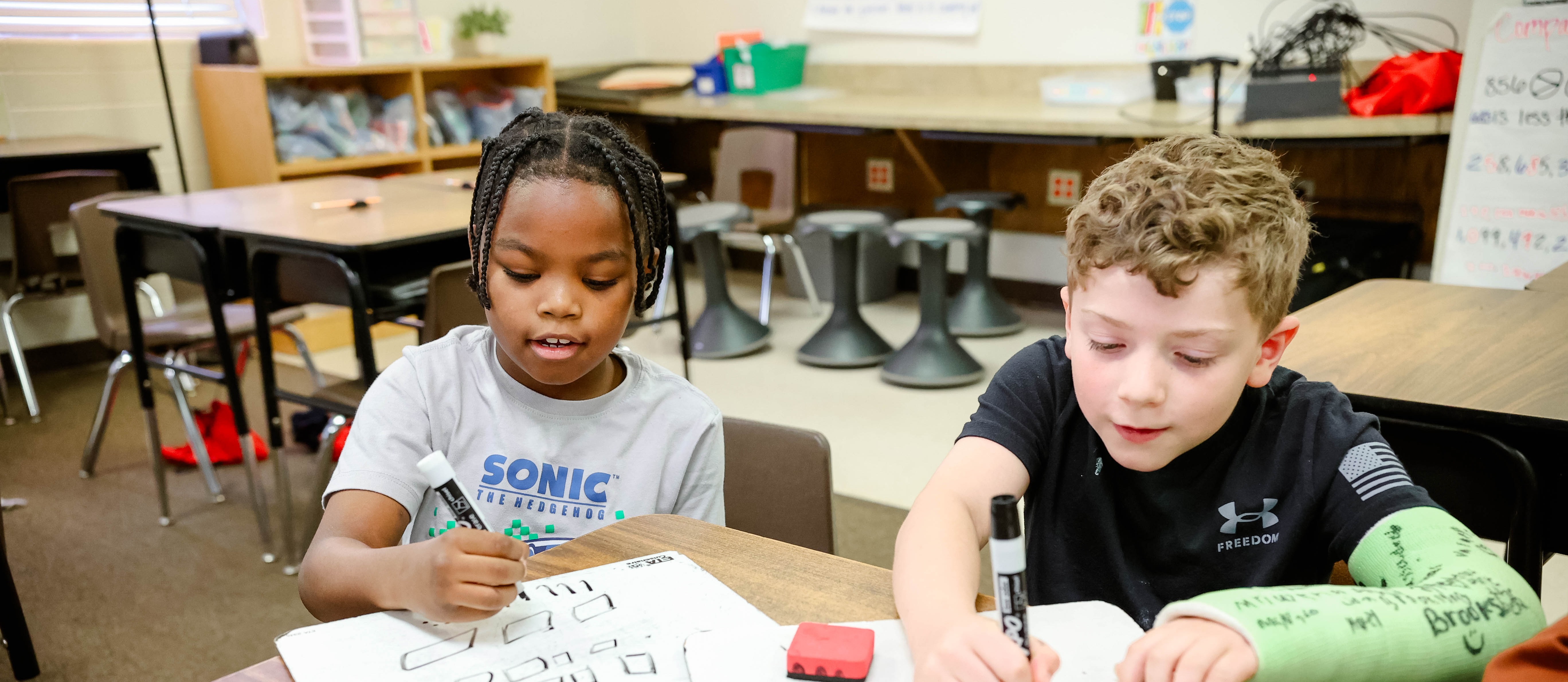2 students working at desk