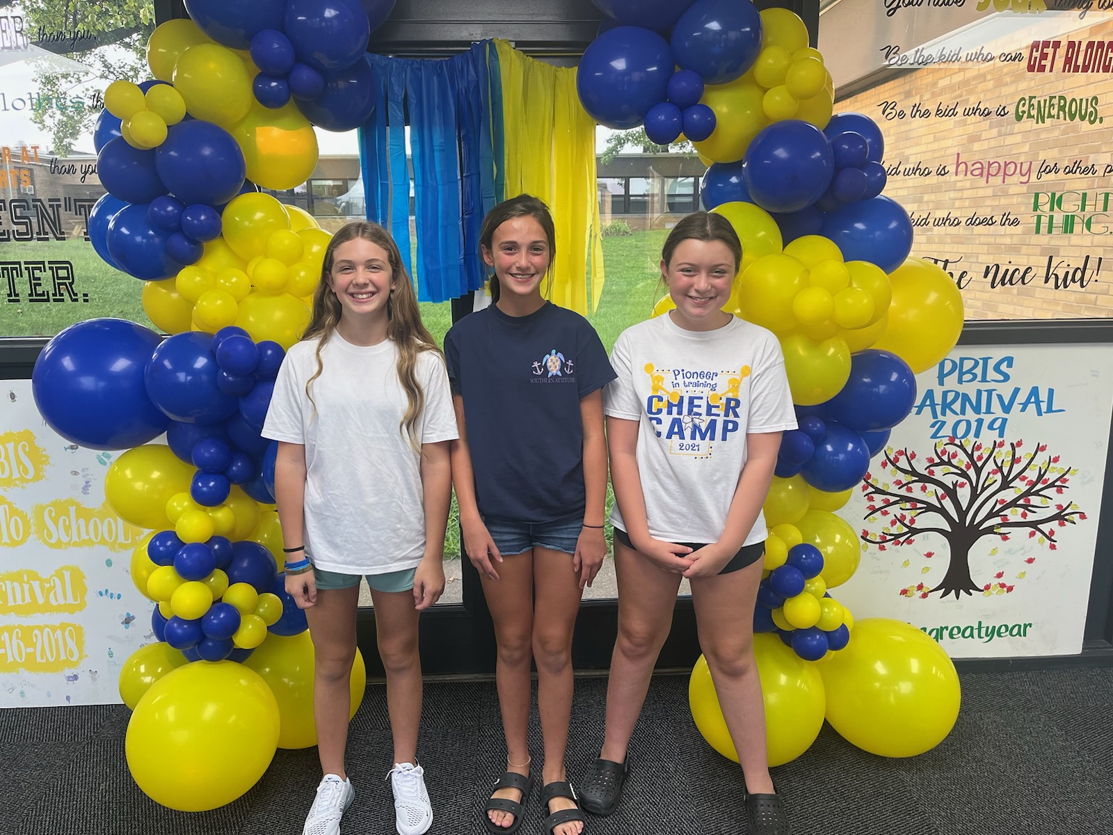 Students in front of ballons
