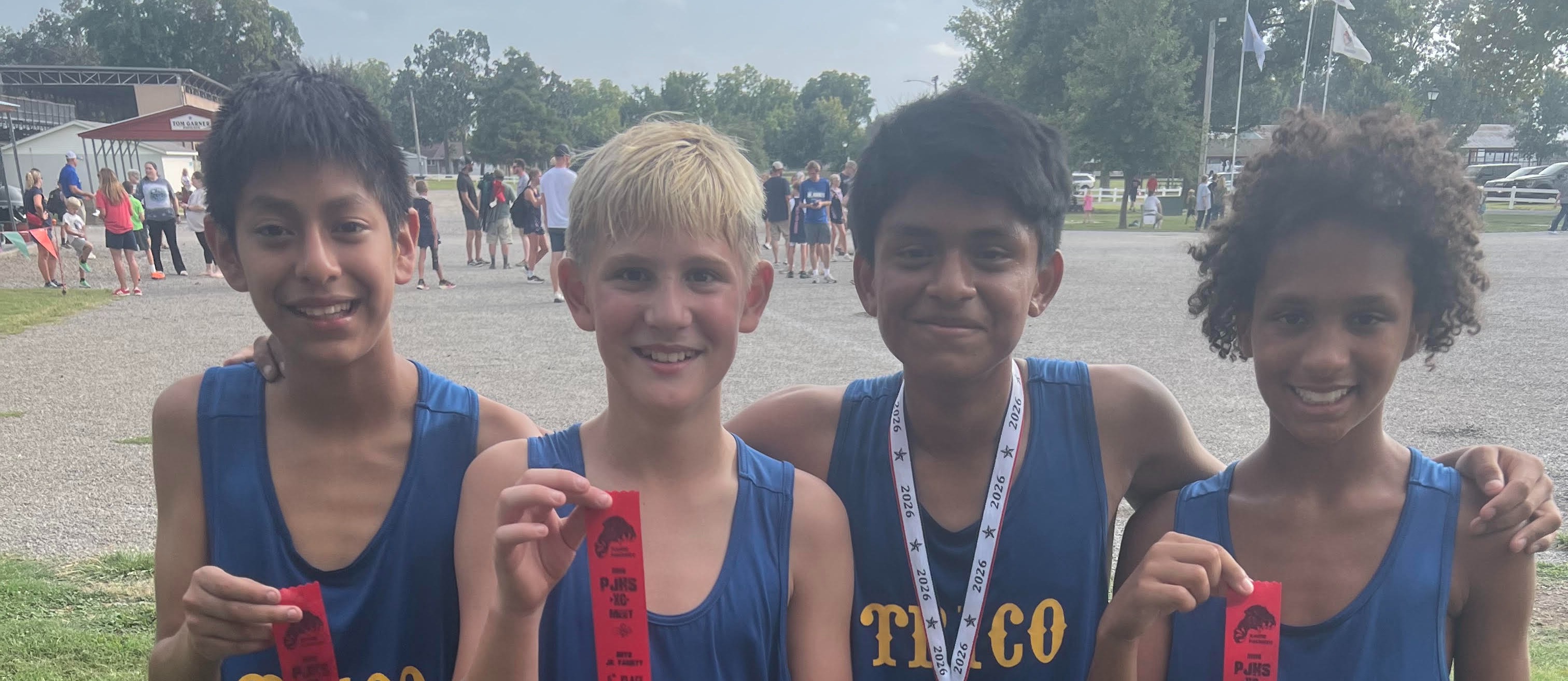 Cross Country Athletes with Medals