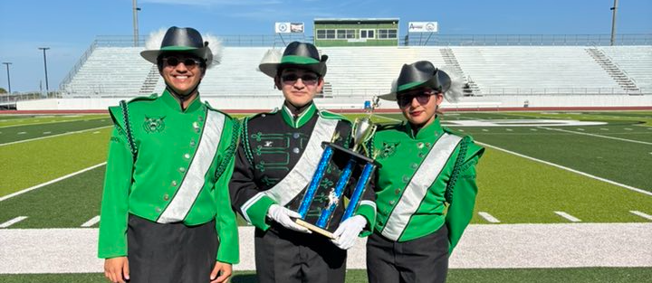 HHS Band holding a trophy