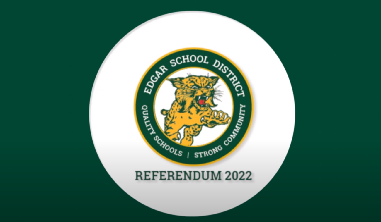Edgar School District Round Green And Yellow Logo on Green Background